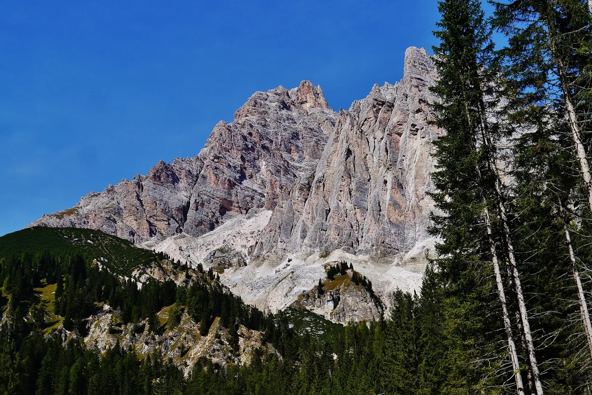 The road over Passo Tre Croci winding through the Dolomite peaks